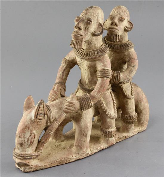 A Sao People Lake Chad area terracotta group of two bearded men riding a horse, height 24cm